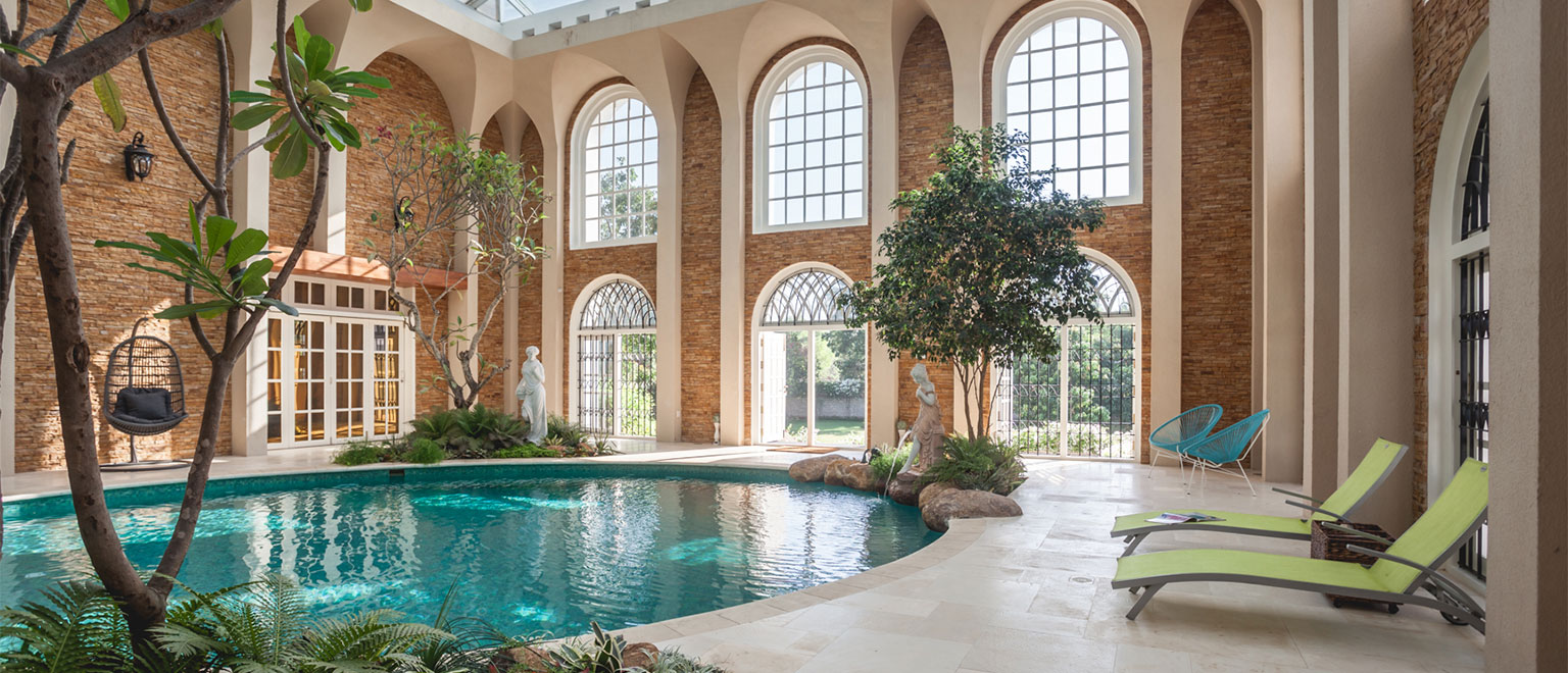 The indoor Swimming Pool  Design with a Mediterranean Vib